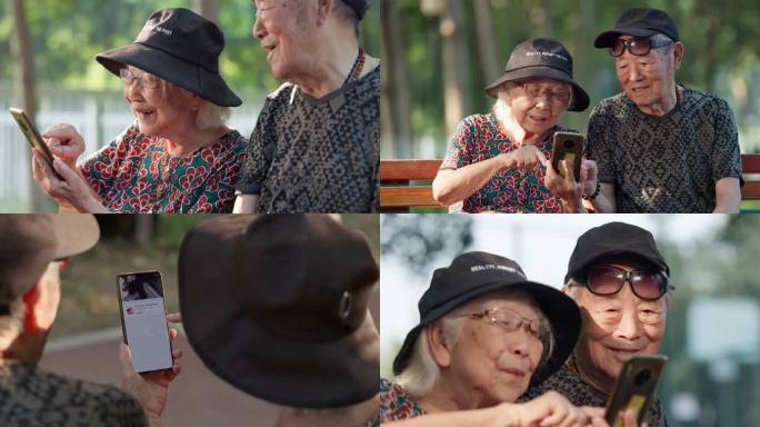 老人幸福的老年夫妇在公园一起看手机聊天