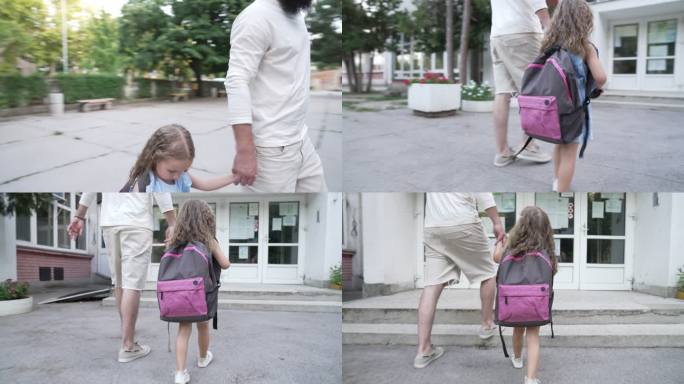 开学第一天幼儿园小女孩父女送上学