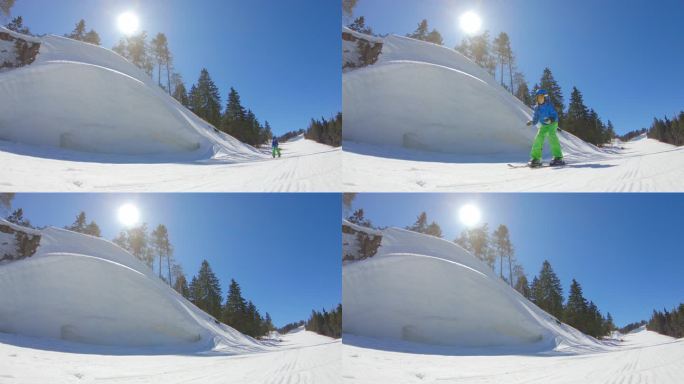 小女孩学滑雪滑雪女孩快速经过冬天雪山森林