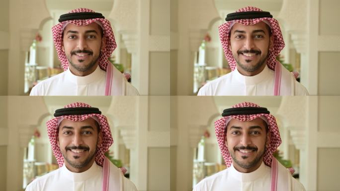 20多岁的沙特男子站在室内特写
