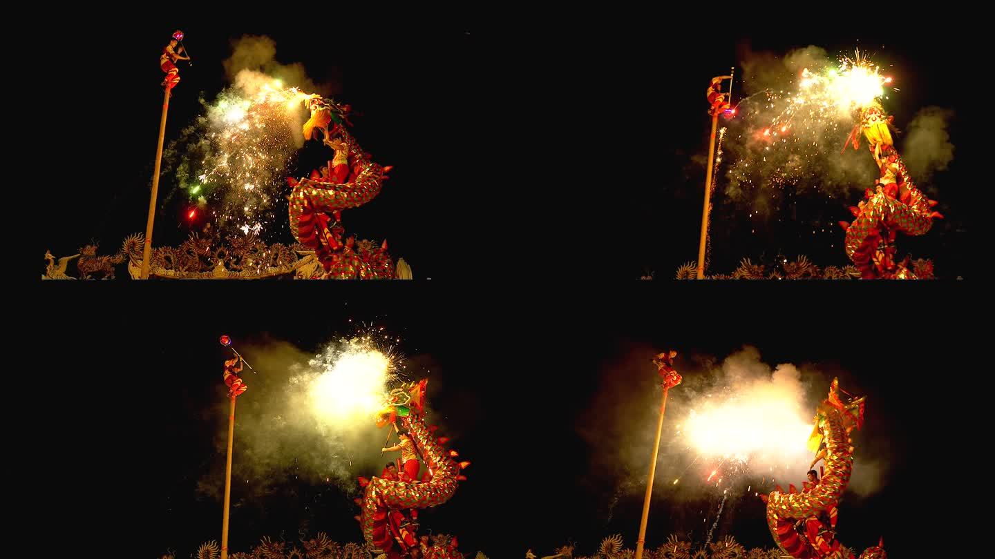 在春节的夜晚，舞龙表演伴随着烟花。