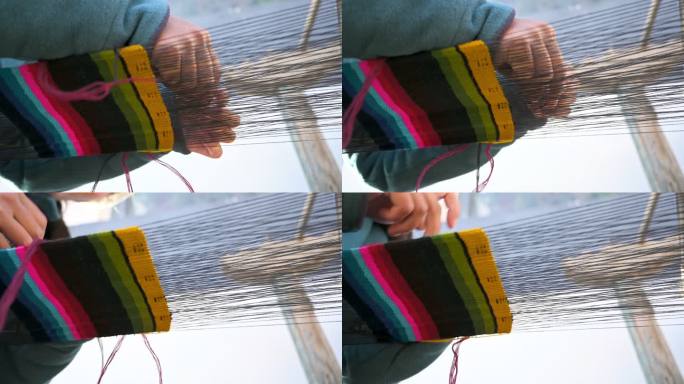 尼泊尔工匠在织布机上编织多色织物