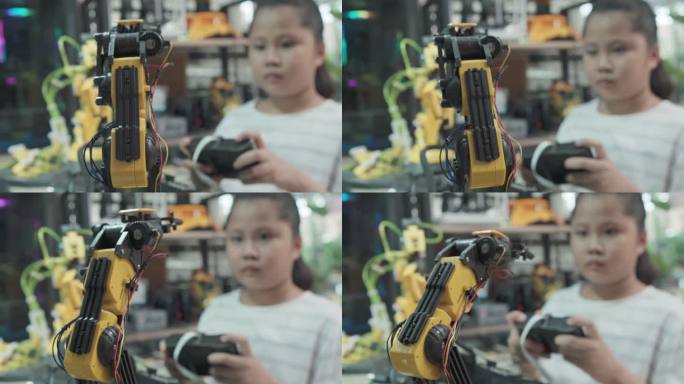 教育主题：女孩学习如何在数字平板电脑上控制机器人手臂，科学工程，教育，技术