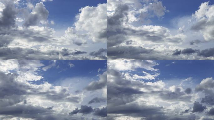 美丽的白色片云在蓝色的天空中慢慢变化。