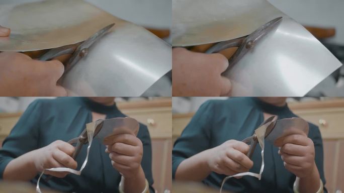 手工艺视频手工匠人锻银雕刻银板裁切慢镜头