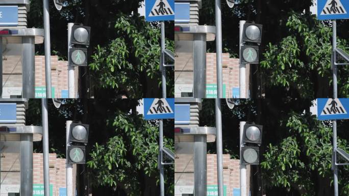 城市路口闪烁变化的红绿灯
