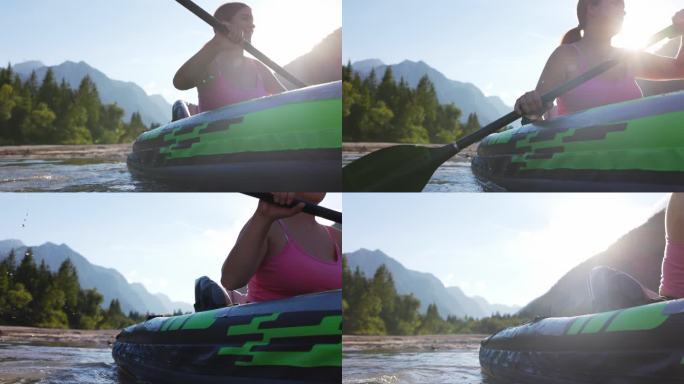 在平静的湖面上划皮划艇的年轻女子