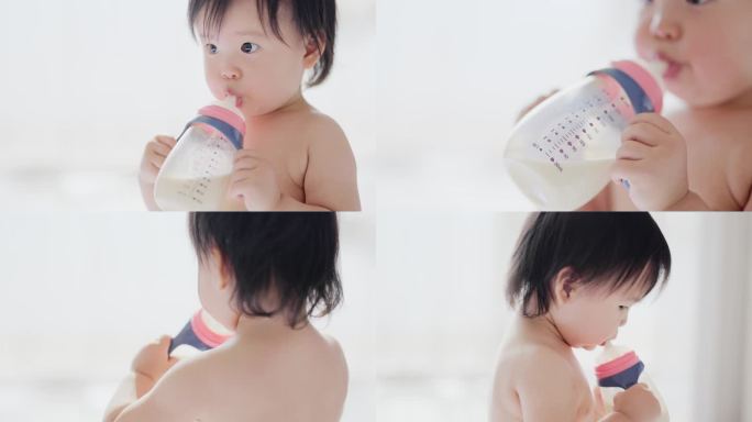 喝奶粉的小宝宝奶粉牛奶奶瓶婴儿