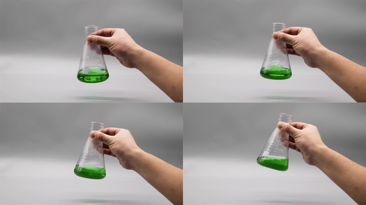 用手摇晃装有绿色溶液的锥形瓶