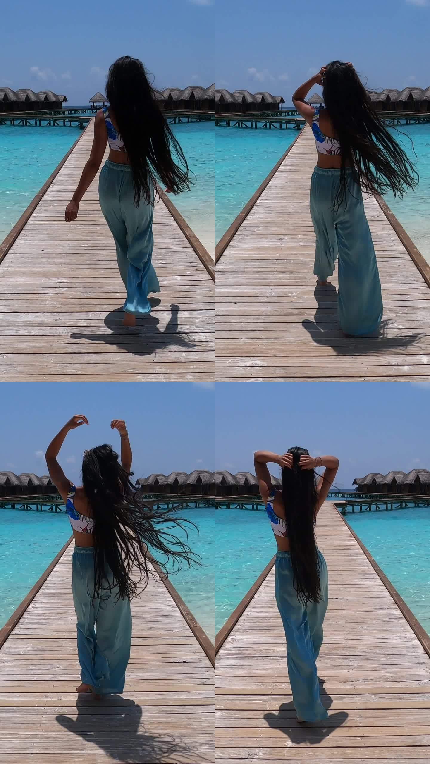 在马尔代夫度假期间，一名亚洲女子在码头上散步，享受阳光