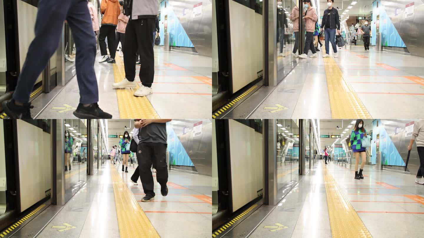 地铁停靠站上下地铁人流脚步慢镜