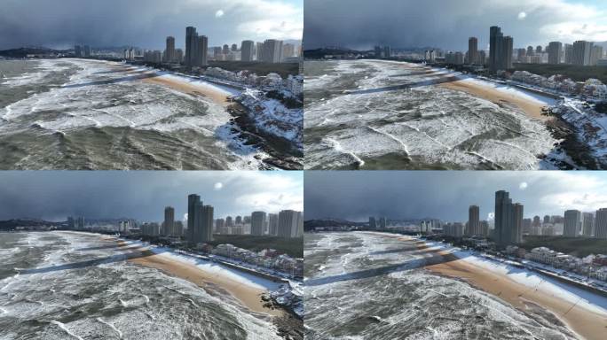 航拍威海国际海水浴场的冬季雪景