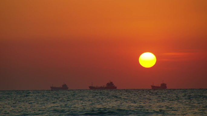 海边 日落 船只 夕阳