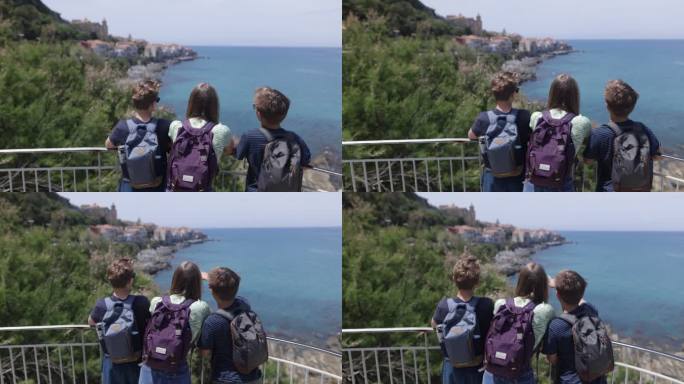 三个少年看着西西里岛的塞法鲁镇