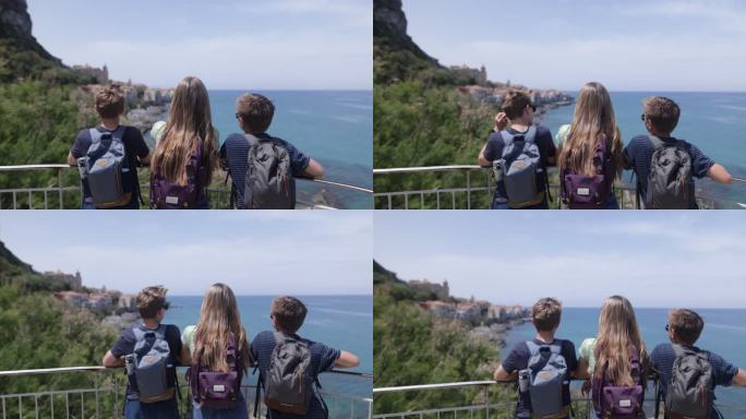 三个少年看着西西里岛的塞法鲁镇