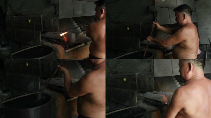 工作中的铁匠农村铁匠淬火赤裸上身