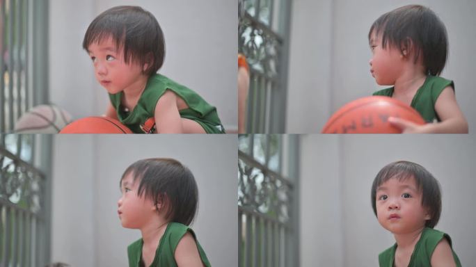 夏季周末，亚洲中国男婴在家门口打球