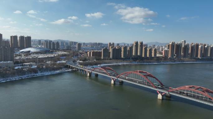 冬季航拍东北吉林市松花江上的大桥