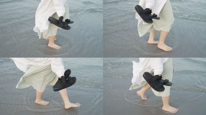 沙滩上散步的女人腿