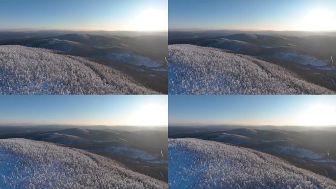 航拍夕阳下的林海雪原山林