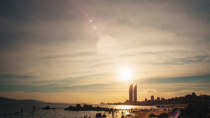 福建厦门沙滩与双子塔日落延时摄影