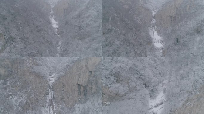 冬季大山雪景下雪空镜航拍