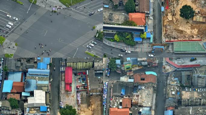 航拍城市路口斑马线过马路车流