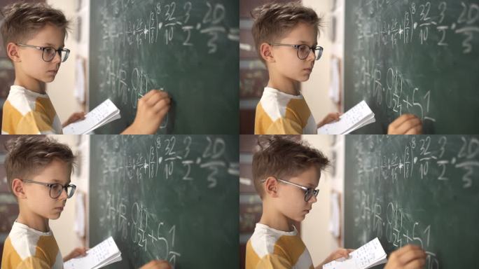 小男孩在数学课上计算分数