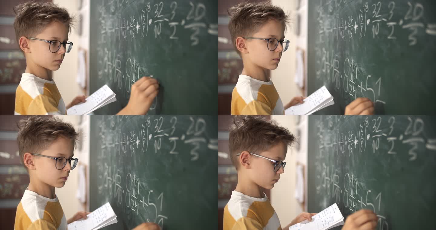 小男孩在数学课上计算分数