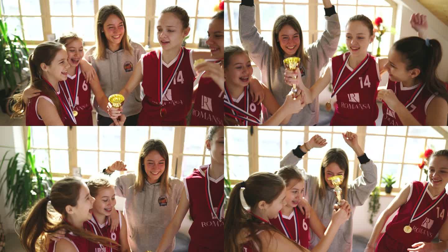女孩篮球运动员在家与教练一起庆祝赢得奖杯