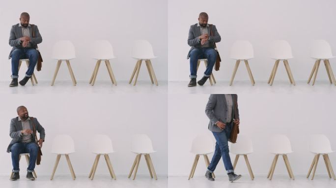 4k视频画面显示，一位英俊的成熟商人独自坐在办公室等待面试