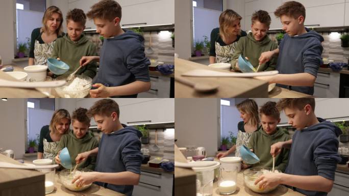 母亲和儿子一起做酵母蛋糕