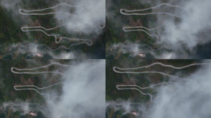 垂直航拍云海中金华北山盘山公路与观景台