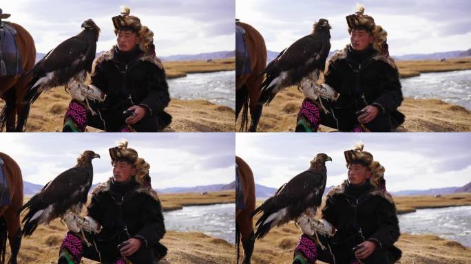 蒙古河边的鹰猎人画像