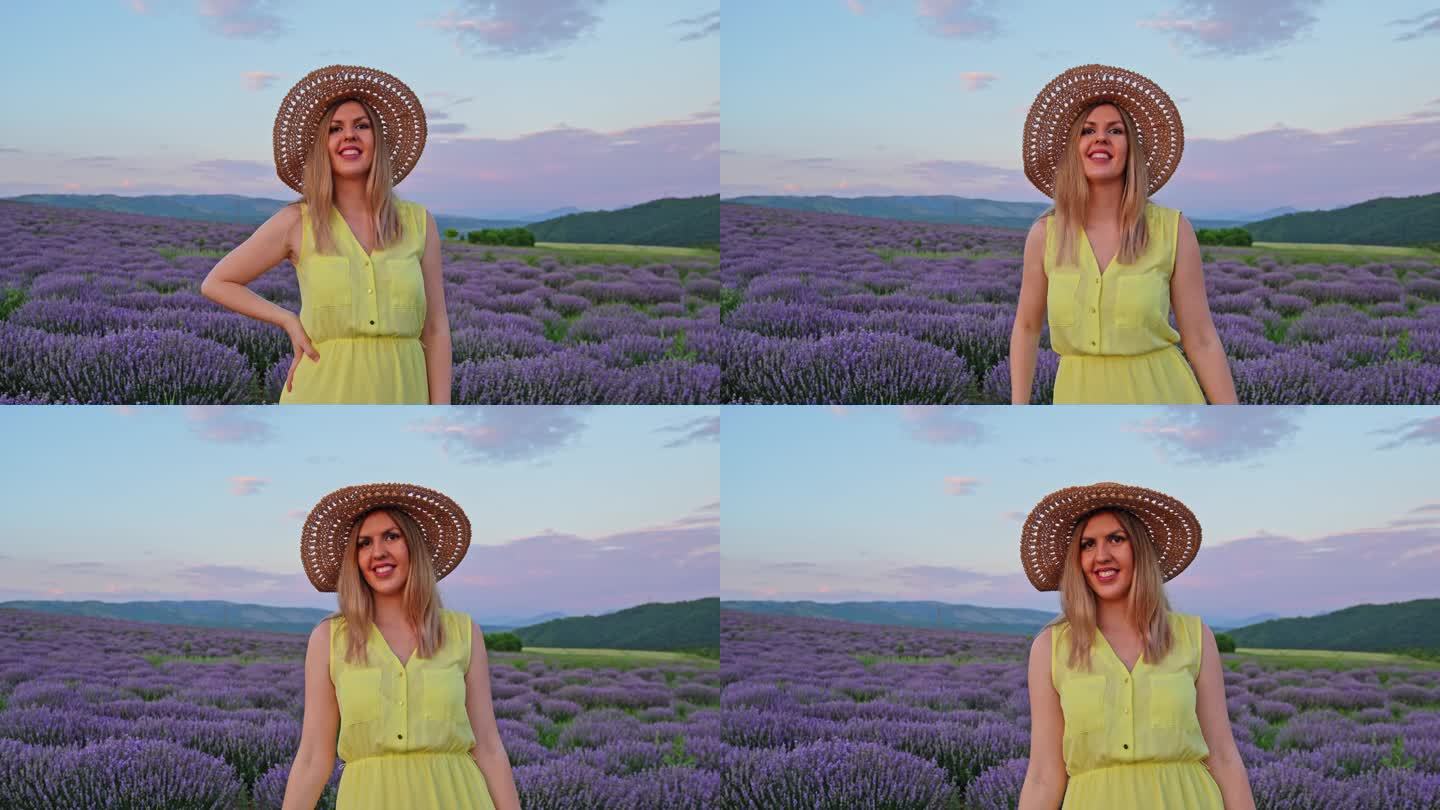 紫色薰衣草田里的年轻女人