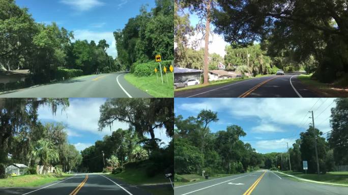 佛罗里达州Keystone Heights的一条弯曲的树冠道路上，天空中布满了零星的云，夏季的过度流