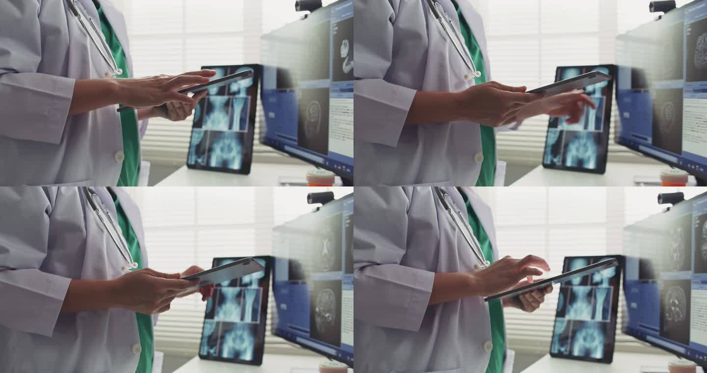 医生在工作中使用数字平板电脑