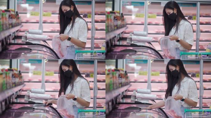 亚洲女人在超市买肉