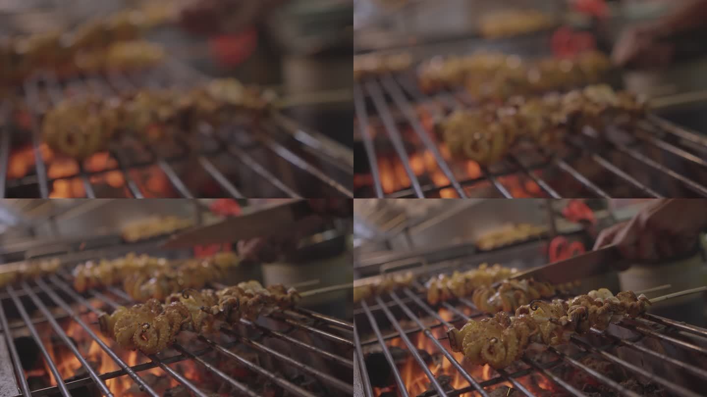 泰国曼谷耀瓦拉特的亚洲街头美食——煤炉上的烤鱿鱼特写