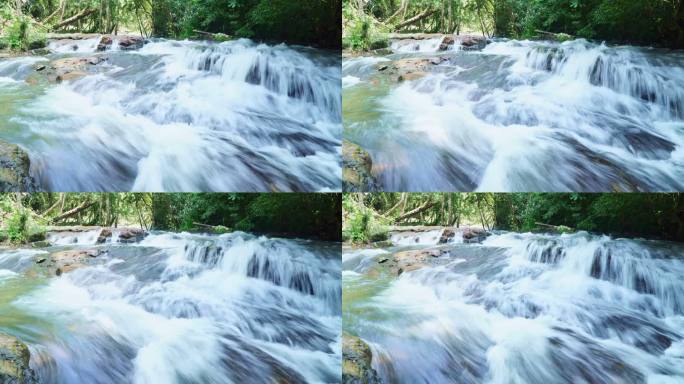 山涧水从岩石和巨石上跌落的视频片段