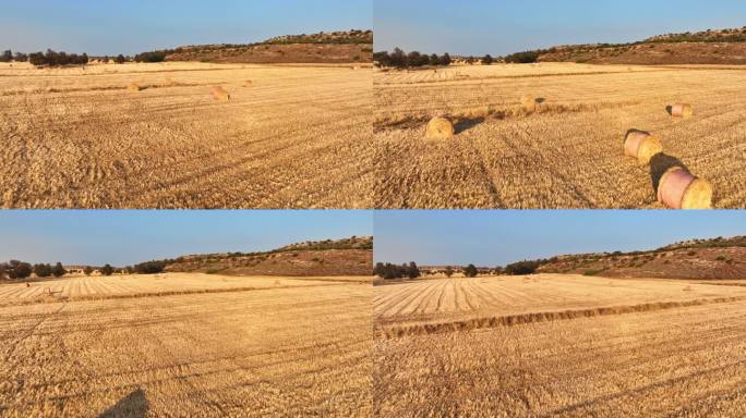 收割后的干草堆农田的无人机航拍画面