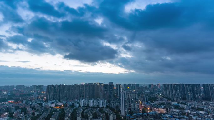 城市白天到黑夜日转夜晚霞万家灯火延时