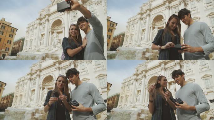 旅游情侣用复古的即时相机自拍