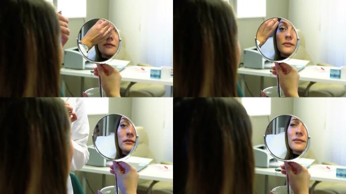 在美容诊所接受微针嫩肤治疗的年轻女性。库存视频