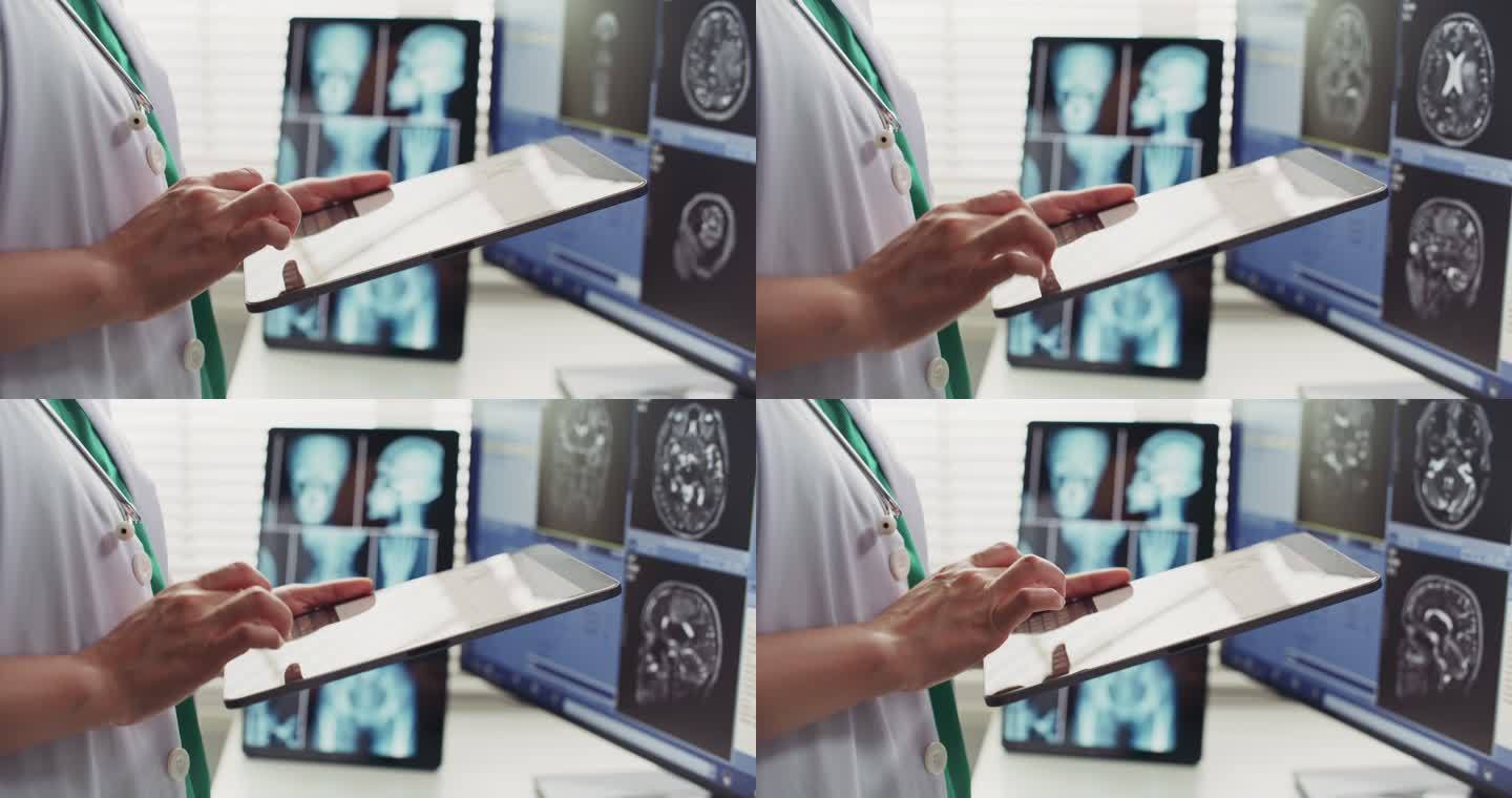 医生在工作中使用数字平板电脑
