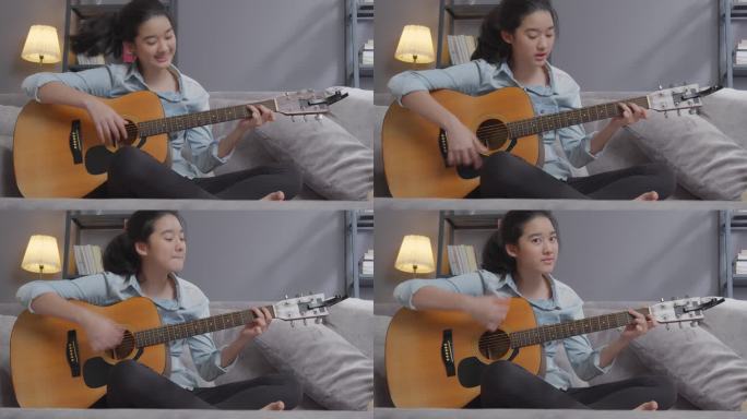 快乐的青少年女孩在家里的客厅里弹吉他，有创造性的爱好