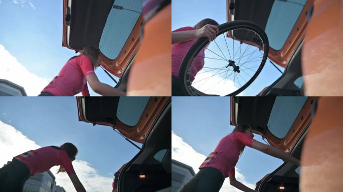 低角度亚洲中国年轻女子将公路自行车卸进汽车后备箱准备周末早晨的公路旅行