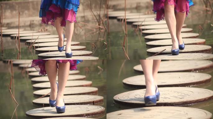 池塘边美女脚步特写跟焦实拍视频素材