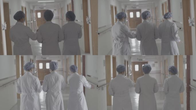 一群医生走在医院走廊的背影