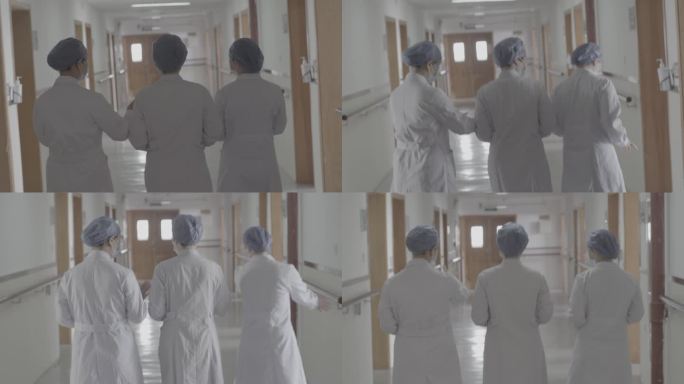 一群医生走在医院走廊的背影
